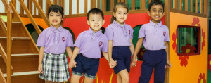 Preschool kids holding hands